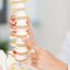 A finger pointing at bone in spine